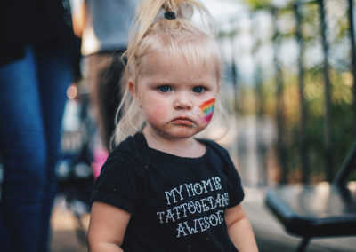 little blond girl with face painting